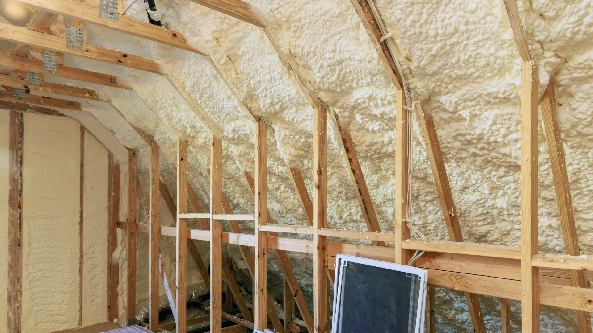 Insulation work in Shetland: insulated roof space with exposed timber framing